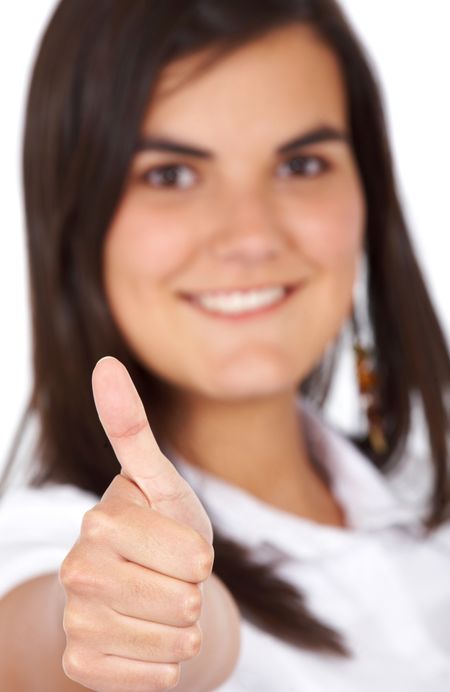 business woman doing the thumbs up sign smiling - isolated over a white background