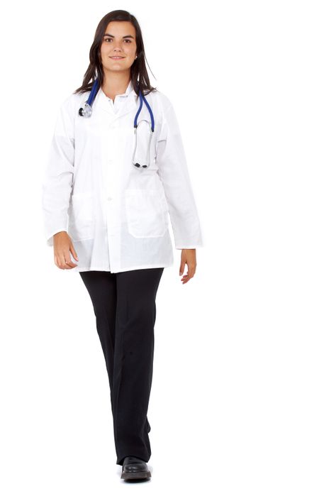 female doctor walking towards the camera smiling isolated over a white background