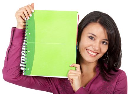 casual female student smiling and holding a notebook - isolated over a white background