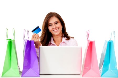 Happy woman shopping online - isolated over a white background