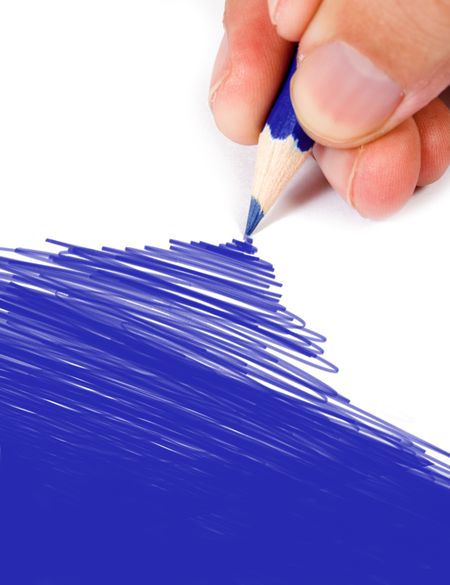 hand coloring a paper in blue