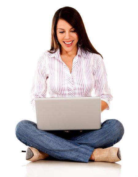 Woman working on a laptop - isolated over a white backgorund