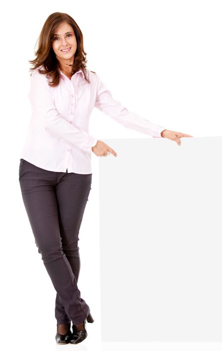 Businesswoman pointing at a banner - isolated over a white background