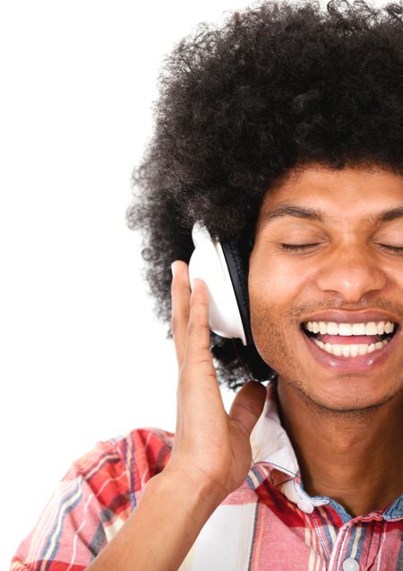 Black man with headphones listening to music - isolated over a white background