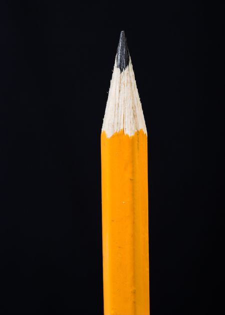 pencil over black