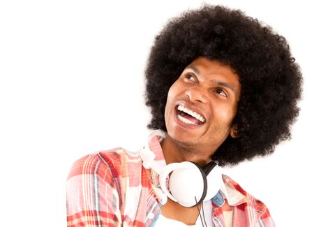Happy afro man with headphones laughing - isolated over a white background