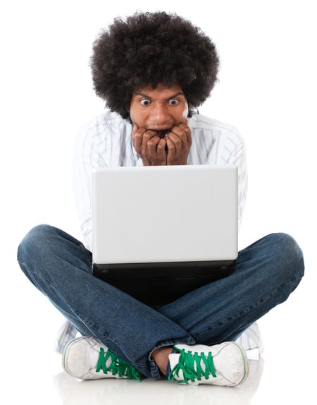 Stressed man with a laptop - isolated over a white background