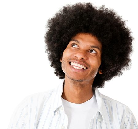 Happy afro man daydreaming - isolated over a white background