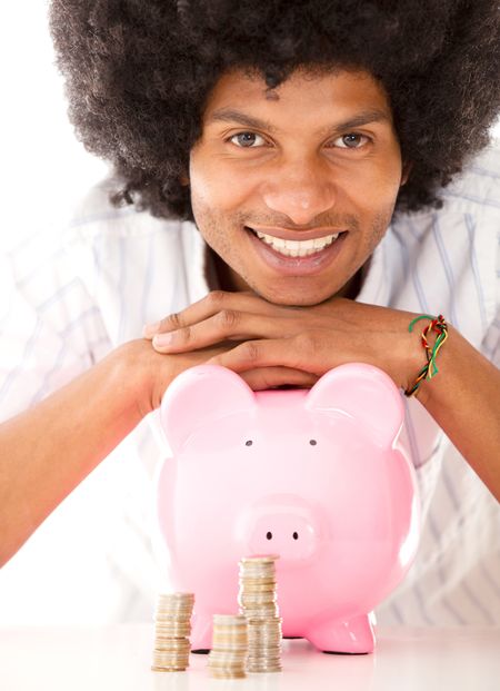 Black man with a piggybank - isolated over a white background
