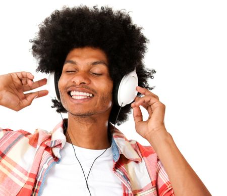 Afro man with headphones enjoying the beat - isolated over a white background