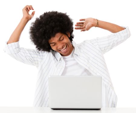 Man having fun on his laptop - isolated over a white background