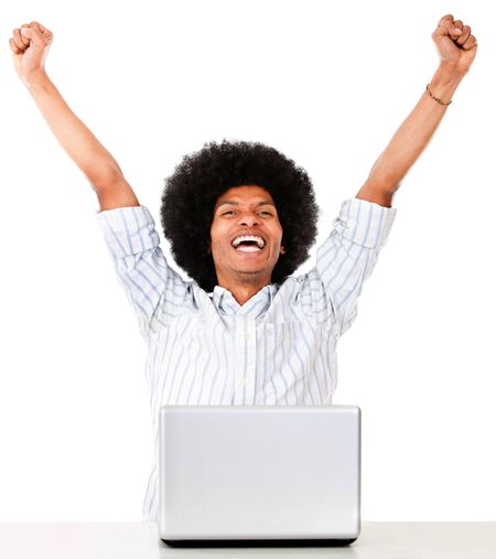 Successful man on a laptop computer - isolated over a white background