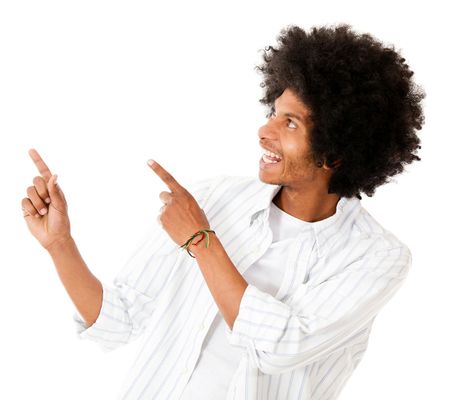 Happy afro man pointing at something - isolated over white background