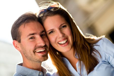 Portrait of a loving couple looking very happy and smiling