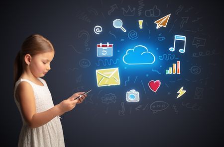 Adorable girl working on tablet with application and gadgets concept