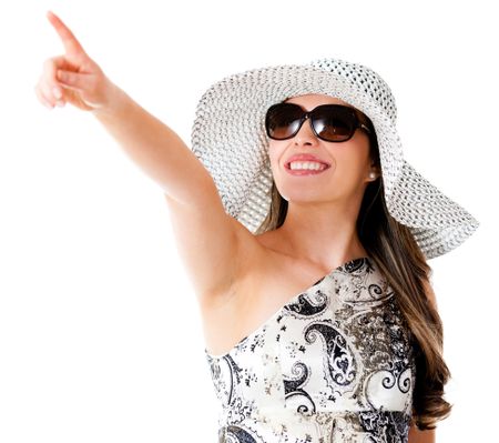 Summer woman pointing - isolated over a white background