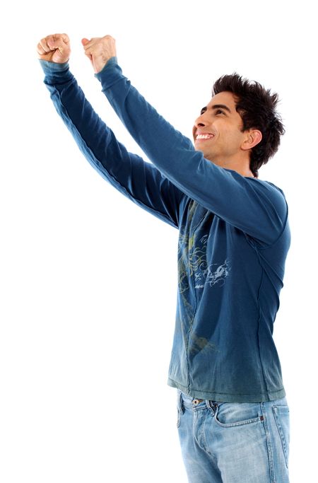 casual man looking happy with arms up isolated over a white background