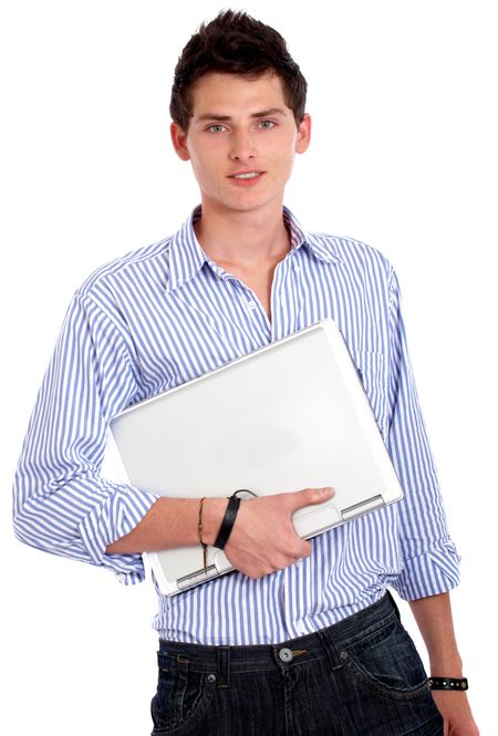 casual college student smiling and holding a laptop isolated over a white background