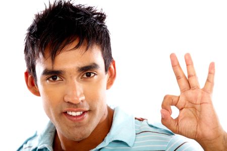 casual man doing the okay sign isolated over a white background