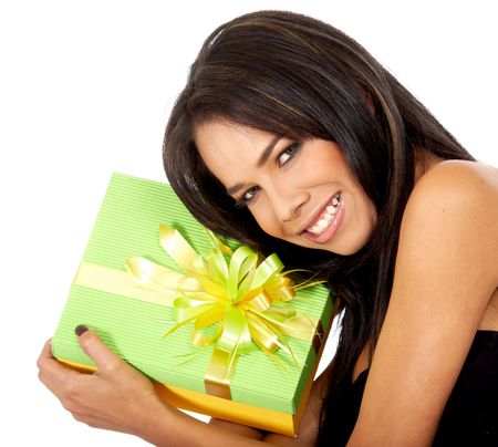 girl holding a gift box - isolated over a white background
