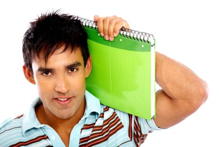 casual college student smiling and holding some notebooks isolated over a white background