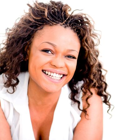 African American woman laughing and looking very happy