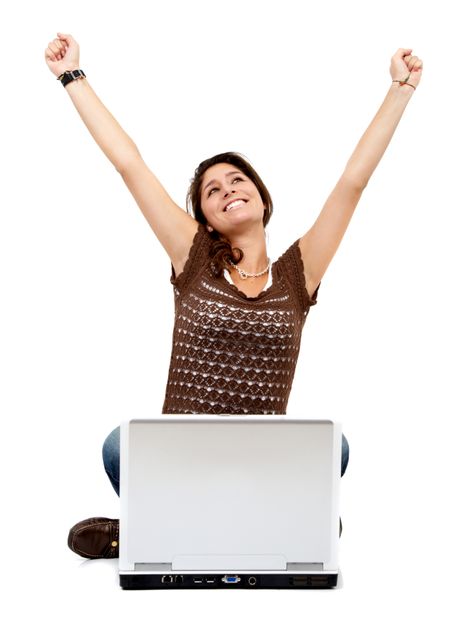 casual success girl on a laptop - isolated over a white background