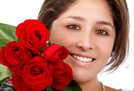 beautiful girl with roses smiling isolated over a white background