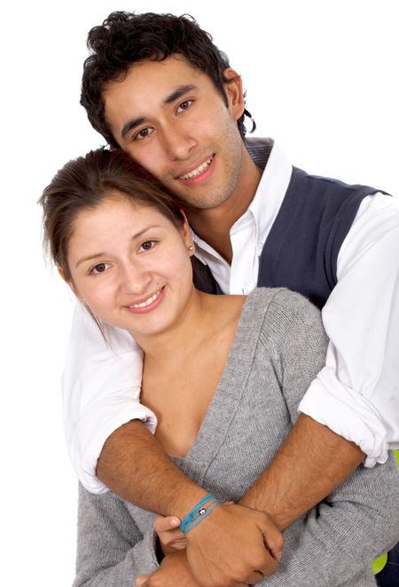 casual couple of young adults smiling isolated over a white background