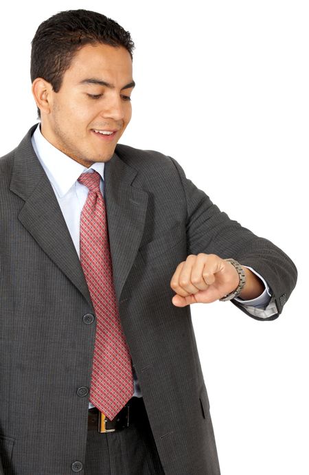 Business Man looking at the time isolated over a white background