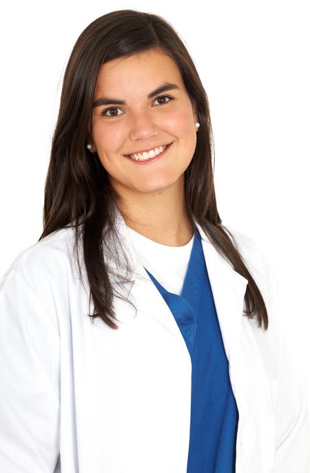 friendly woman doctor smiling isolated over a white background