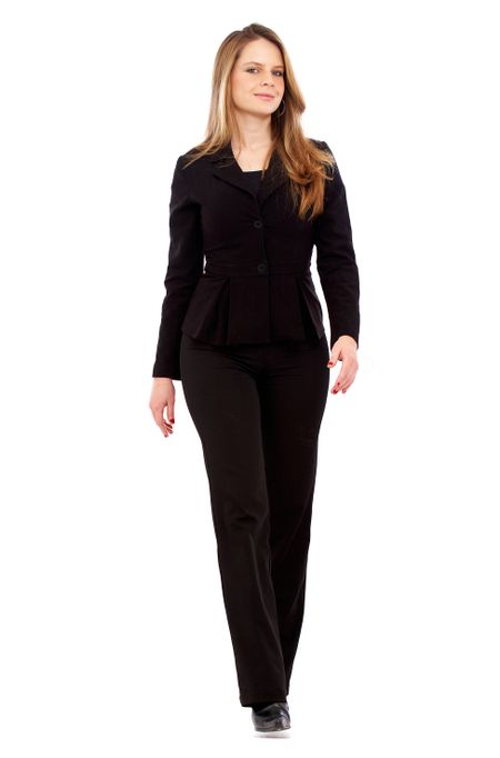 business woman walking towards the camera isolated over a white background