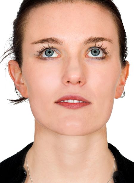 beauty portrait with eyes looking up over a white background