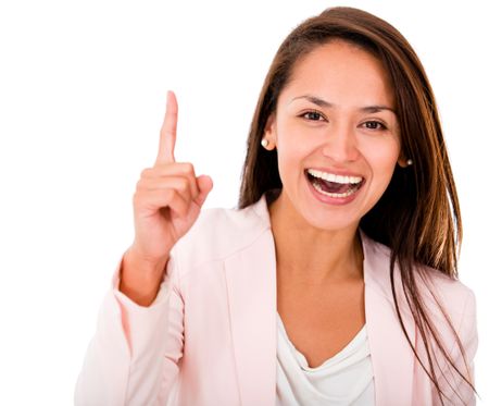 Excited business woman pointing up - isolated over white