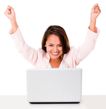 Business woman celebrating her online success - isolated over white