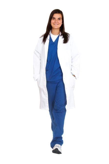female doctor walking towards the camera smiling isolated over a white background
