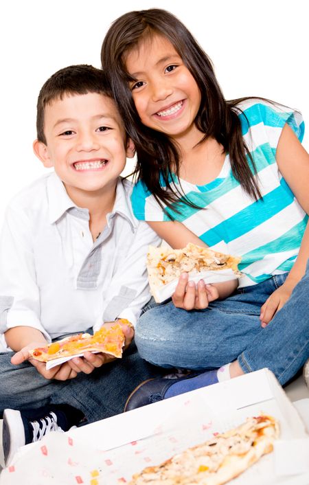 Happy kids eating pizza - isolated over a white background