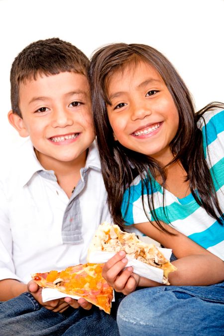 Happy children eating pizza - isolated over a white background