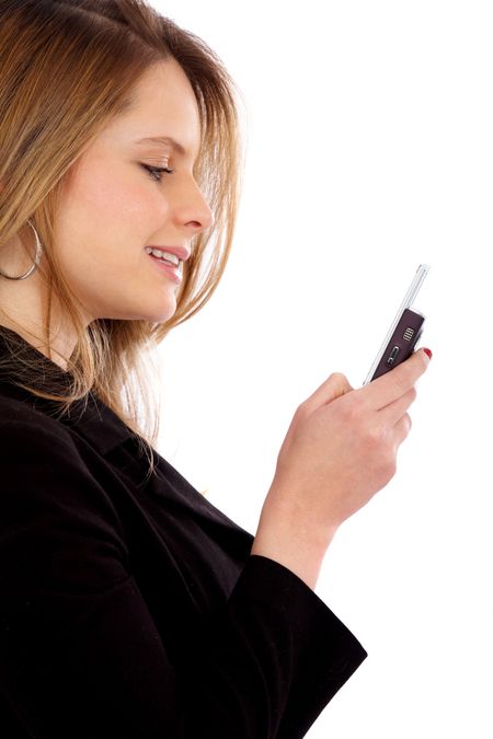 business woman sending a text message on her mobile phone - isolated over a white background