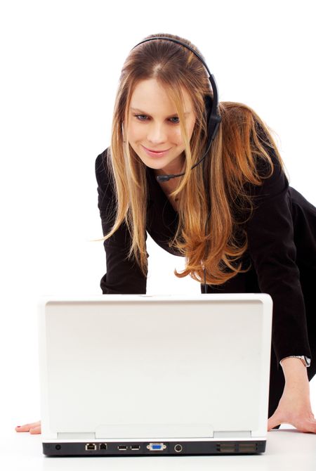 beautiful business customer service woman on a laptop computer - smiling isolated over a white background
