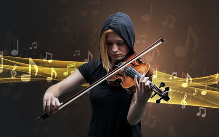 Young male musician playing on his violin with musical notes around