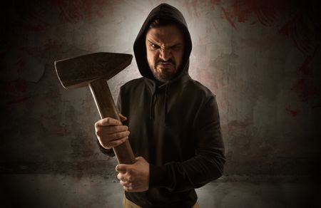 armed-rude-assassin-empty-bloody-room-1201689397 Armed rude assassin in an empty bloody room concept with gun ax chainsaw mallet wrench