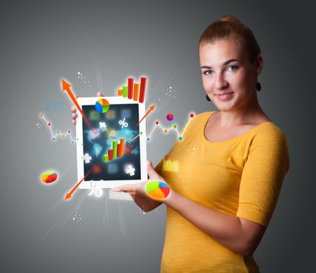 beutiful-woman-holding-modern-tablet-colorful-120306811 beutiful woman holding modern tablet with colorful diagrams and graphs