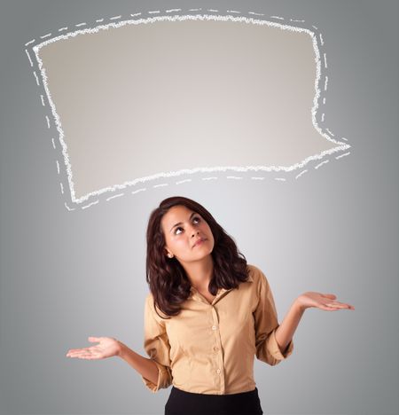 Attractive young woman looking abstract speech bubble copy space