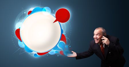 crazy businessman in suite holding a phone and presenting abstract modern speech bubble with copy space
