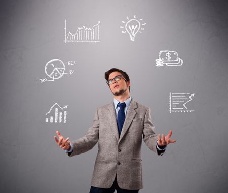 young boy standing and juggling with statistics and graphs