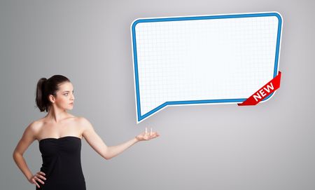 Beautiful young woman presenting modern speech bubble copy space