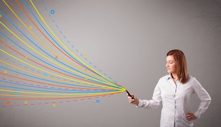 Happy young girl holding a phone with colorful abstract lines