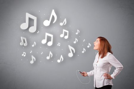 Pretty young woman singing and listening to music with musical notes getting out of her mouth