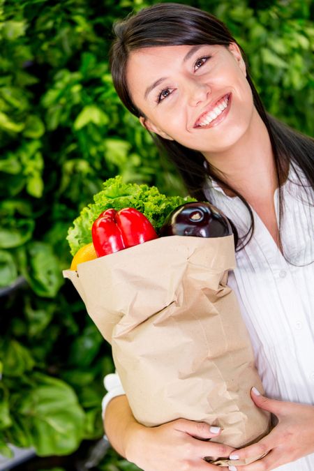 Happy woman healthy shopping at the supermarket